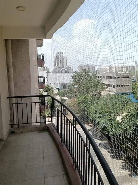 Curved balcony safety net by Quality Anti Bird Net Services